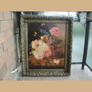 quadro con fiori olio su tela con splendita cornice con puttini 70x85